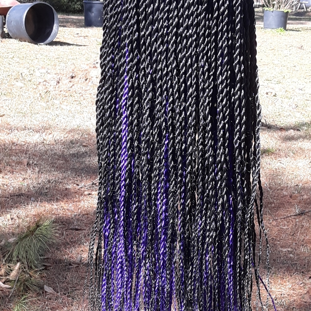 Purple and black Senegalese twist unit.